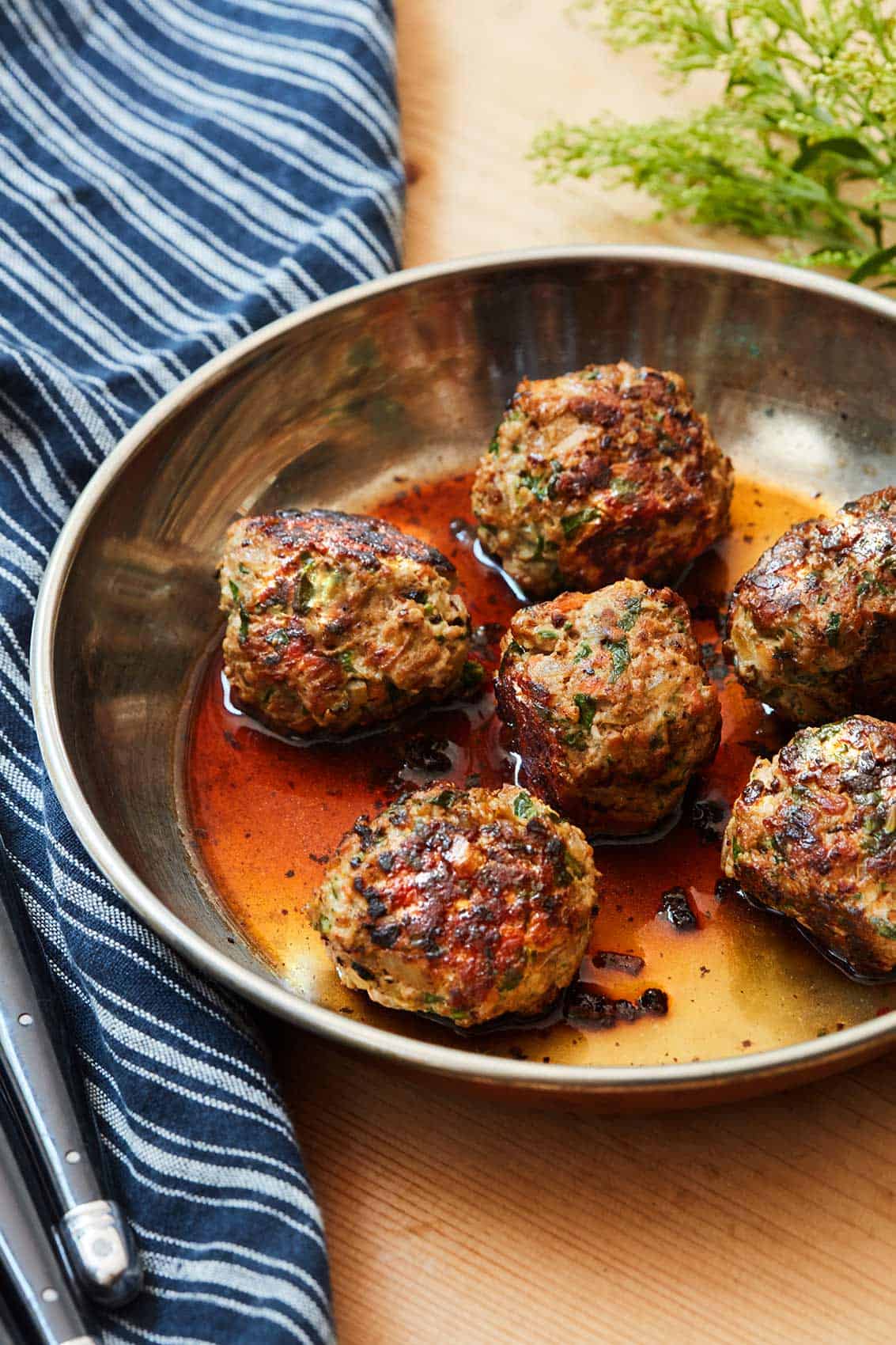 Turkey Meatballs served in silver pan on wooden surface