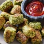 Pinterest graphic of broccoli tater tots with a dipping bowl of ketchup.
