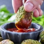 Pinterest graphic of a single broccoli tater tot being dipped into sauce.