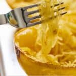 Pinterest graphic of a fork pulling out the noodles from spaghetti squash.
