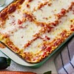 Pinterest graphic of a casserole dish of vegetarian lasagna.
