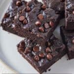 Pinterest graphic of a plate of multiple avocado brownies.