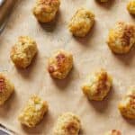 Pinterest graphic of a sheet pan of baked cauliflower tater tots.