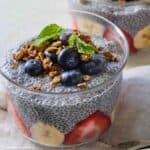 Pinterest graphic of two bowls of chia pudding with fresh fruit.