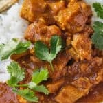 Pinterest graphic of a serving of Instant Pot chicken tikka masala with cilantro as garnish.