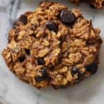 Pinterest graphic of a close up of one banana oatmeal cookie.