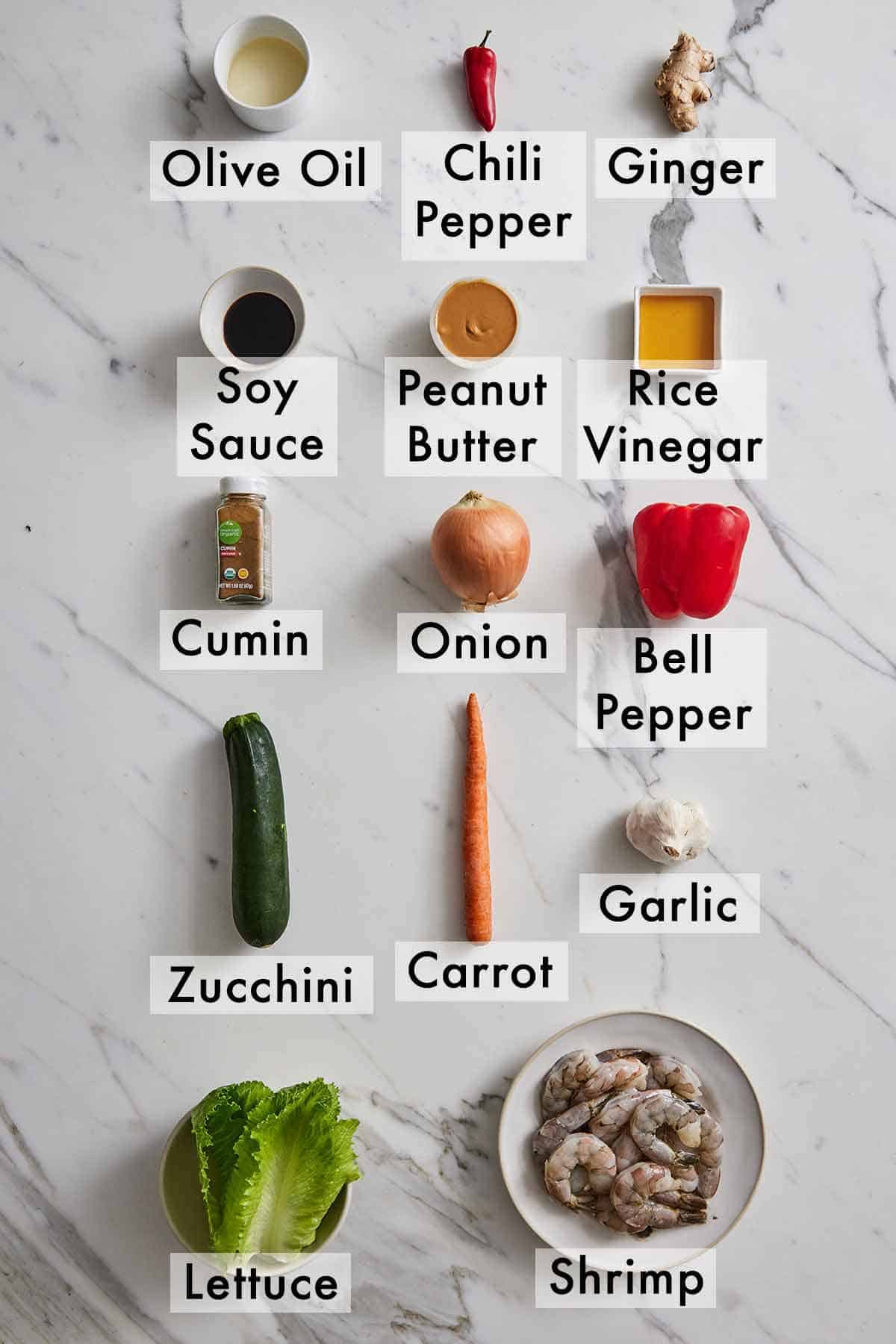 Ingredients needed to make shrimp lettuce wraps.