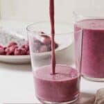 Pinterest graphic of dragon fruit smoothie being poured into a glass.