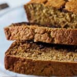 Pinterest graph of the close up of two slices of banana bread.