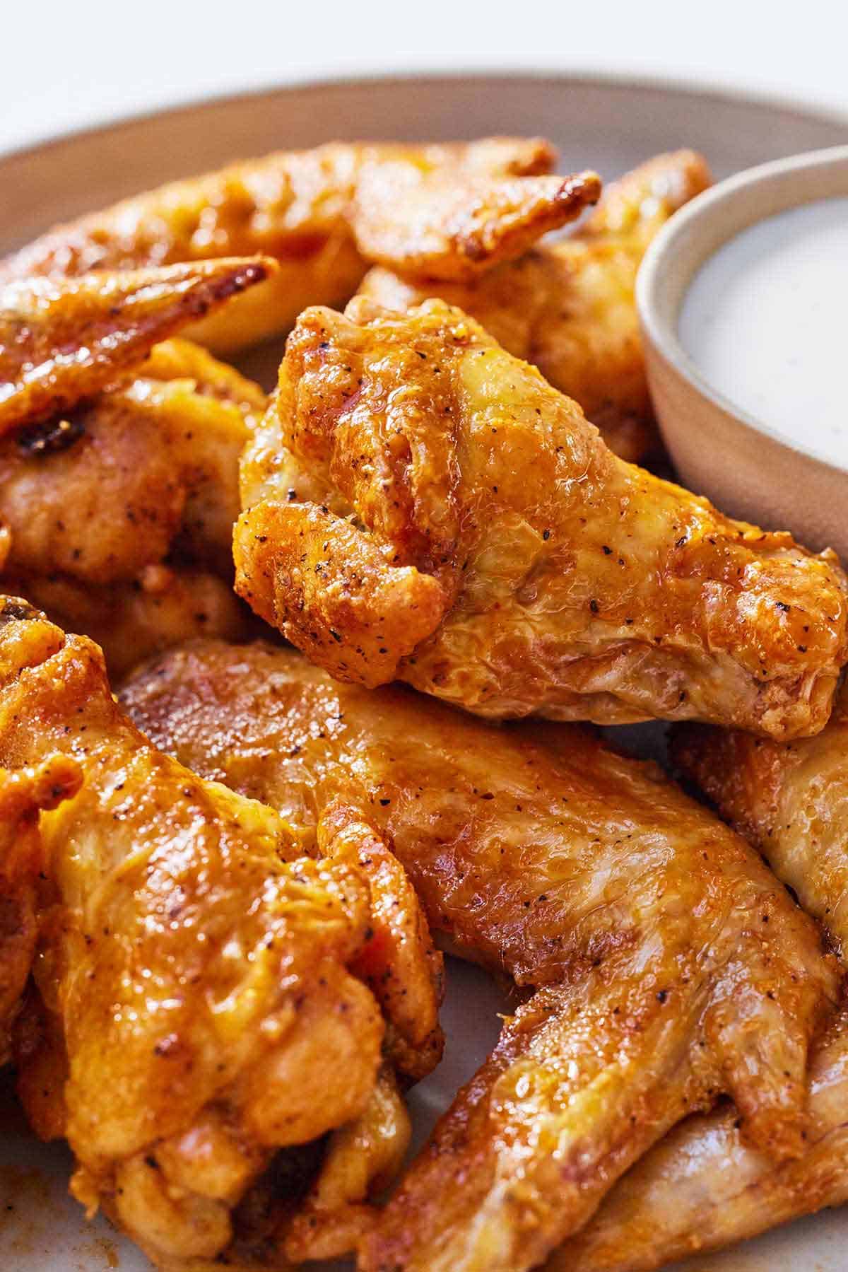 Close up of air fryer chicken wings.