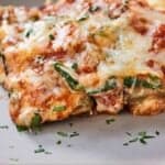 Pinterest graphic of a serving of eggplant lasagna on a plate.