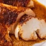 Pinterest graphic of a close up view of baked cod for fish tacos.
