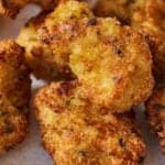 Pinterest graphic of a close up view of air fryer chicken nuggets.