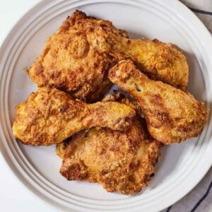Overhead view of a plate of air fryer fried chicken.