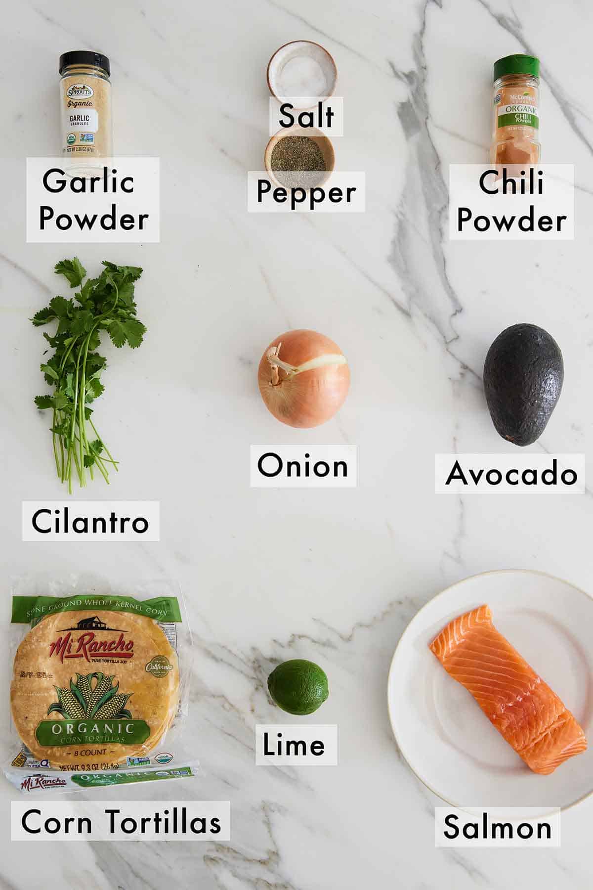 Ingredients needed to make salmon tacos.