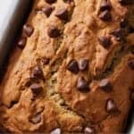 Pinterest graphic of an overhead view of a loaf of gluten free chocolate chip banana bread.