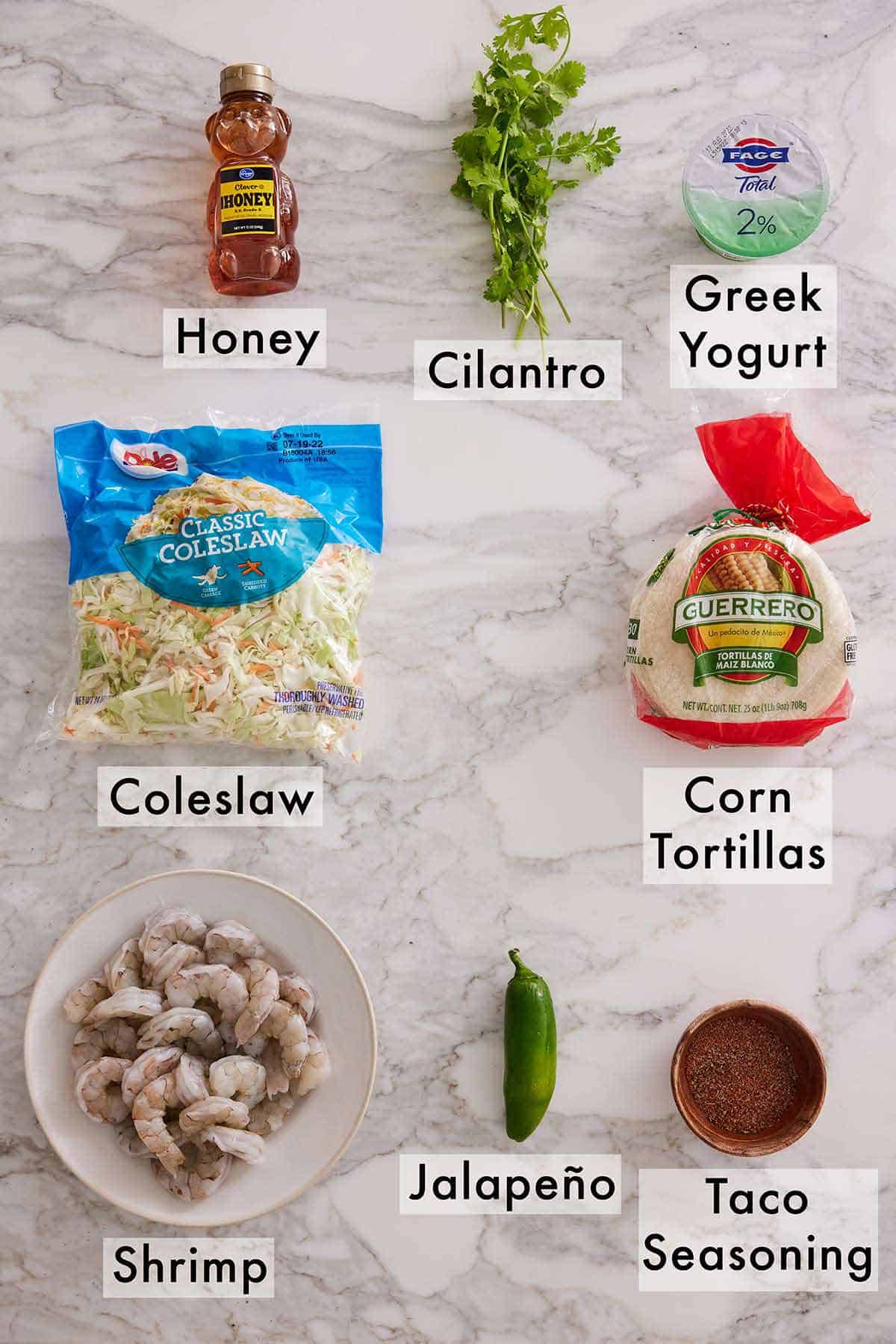 Ingredients needed to make shrimp tacos.