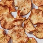 Pinterest graphic of a close view of crispy air fryer apple chips.