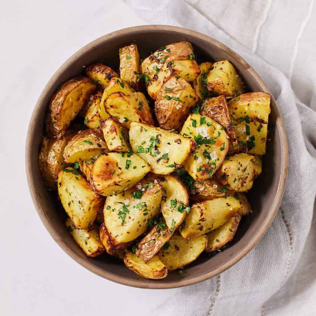 Air Fryer Greek Lemon Potatoes - Cooking With Coit